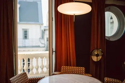 Un ou plusieurs lits dans un hébergement de l'établissement Hôtel Le Ballu