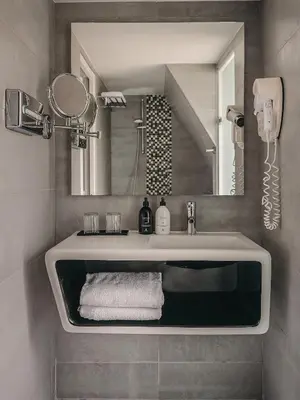 Salle de bains dans l'établissement Hôtel Belloy