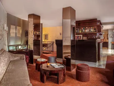 Télévision ou salle de divertissement dans l'établissement Hôtel Belloy