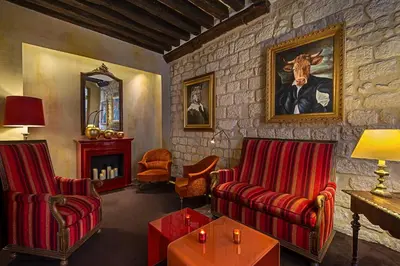 Coin salon dans l'établissement Hôtel Saint-Paul Rive-Gauche