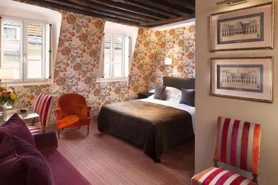 Un ou plusieurs lits dans un hébergement de l'établissement Hôtel Saint-Paul Rive-Gauche