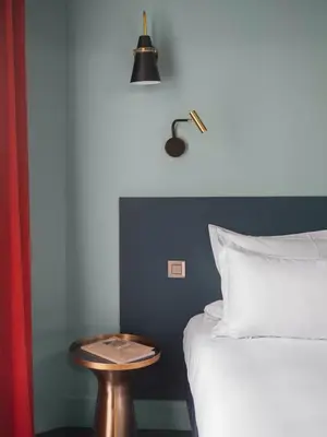 Un ou plusieurs lits dans un hébergement de l'établissement Hôtel Edgar & Achille