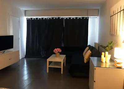 Télévision ou salle de divertissement dans l'établissement Lovely Flat Champs de Mars Eiffel
