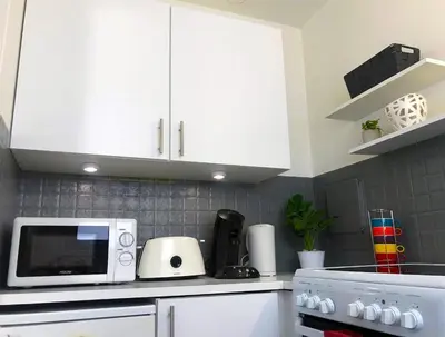 Cuisine ou kitchenette dans l'établissement Lovely Flat Champs de Mars Eiffel