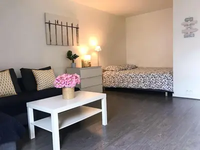 Un ou plusieurs lits dans un hébergement de l'établissement Lovely Flat Champs de Mars Eiffel