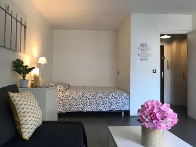 Un ou plusieurs lits dans un hébergement de l'établissement Lovely Flat Champs de Mars Eiffel