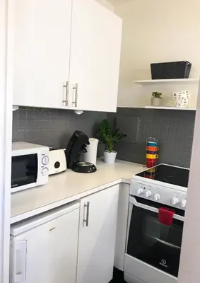 Cuisine ou kitchenette dans l'établissement Lovely Flat Champs de Mars Eiffel