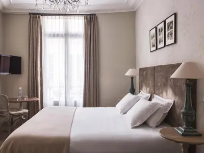 Un ou plusieurs lits dans un hébergement de l'établissement New Hotel Roblin
