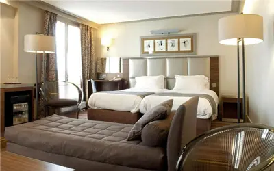 Un ou plusieurs lits dans un hébergement de l'établissement Hotel Berne Opera