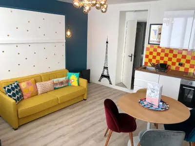 Coin salon dans l'établissement Relais Cocorico Fondary Apartment Eiffel Tower District
