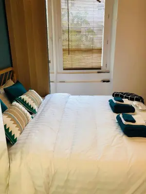Un ou plusieurs lits dans un hébergement de l'établissement Relais Cocorico Fondary Apartment Eiffel Tower District