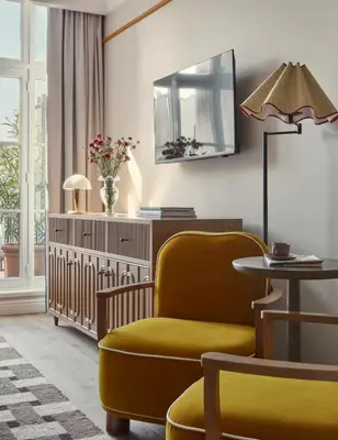 Coin salon dans l'établissement Miiro Le Grand Hôtel Cayré