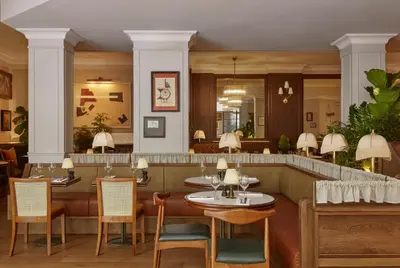 Coin salon dans l'établissement Miiro Le Grand Hôtel Cayré