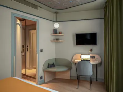 Télévision ou salle de divertissement dans l'établissement Hotel Louison