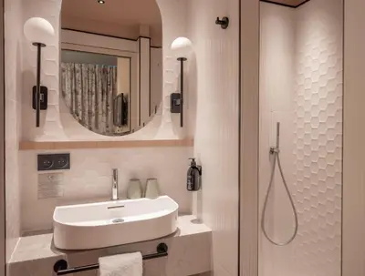 Salle de bains dans l'établissement Hotel Louison