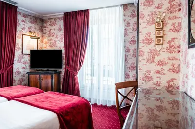 Un ou plusieurs lits dans un hébergement de l'établissement Maison Eugenie