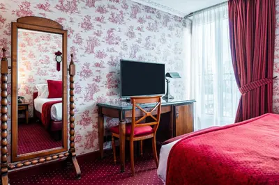 Un ou plusieurs lits dans un hébergement de l'établissement Maison Eugenie
