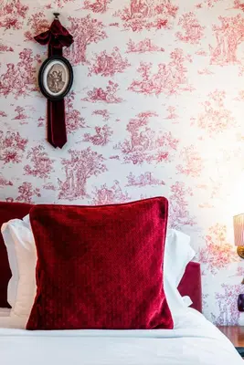Un ou plusieurs lits dans un hébergement de l'établissement Maison Eugenie