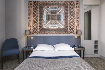 Un ou plusieurs lits dans un hébergement de l'établissement Hotel Saint Christophe