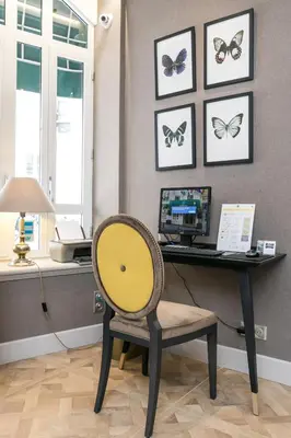 Télévision ou salle de divertissement dans l'établissement Hotel Saint Christophe