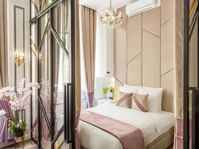 Un ou plusieurs lits dans un hébergement de l'établissement Merveil - Luxury Suite - Marais - Archives I