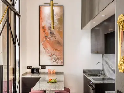 Cuisine ou kitchenette dans l'établissement Merveil - Luxury Suite - Marais - Archives I