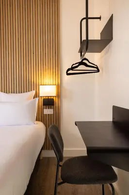 Un ou plusieurs lits dans un hébergement de l'établissement Hotel Korner Eiffel