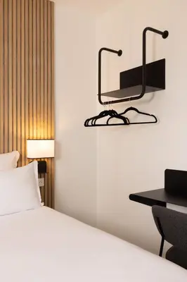 Un ou plusieurs lits dans un hébergement de l'établissement Hotel Korner Eiffel