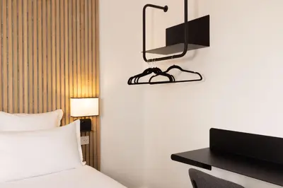 Un ou plusieurs lits dans un hébergement de l'établissement Hotel Korner Eiffel