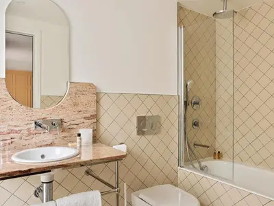 Salle de bains dans l'établissement New Hotel Lafayette
