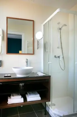 Salle de bains dans l'établissement Montparnasse Alésia