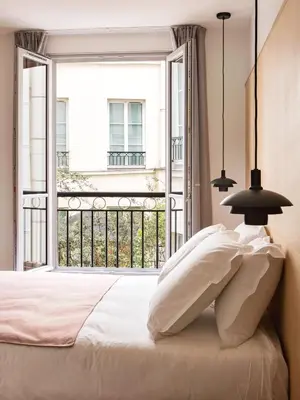 Un ou plusieurs lits dans un hébergement de l'établissement New Hotel Opéra
