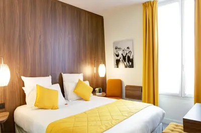 Un ou plusieurs lits dans un hébergement de l'établissement Best Western Plus 61 Paris Nation Hotel