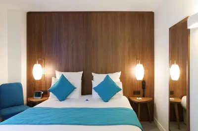 Un ou plusieurs lits dans un hébergement de l'établissement Best Western Plus 61 Paris Nation Hotel
