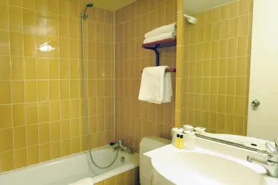 Salle de bains dans l'établissement New Hotel Saint Lazare