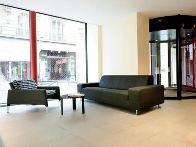 Coin salon dans l'établissement New Hotel Saint Lazare