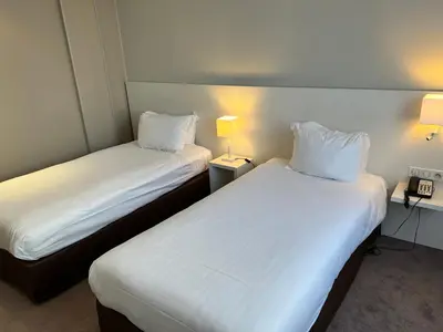 Un ou plusieurs lits dans un hébergement de l'établissement Holiday Inn Paris-Auteuil by IHG