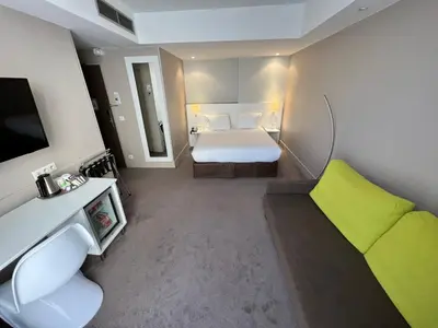 Un ou plusieurs lits dans un hébergement de l'établissement Holiday Inn Paris-Auteuil by IHG