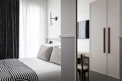 Un ou plusieurs lits dans un hébergement de l'établissement Best Western Premier The Blake Paris Gare Saint Lazare