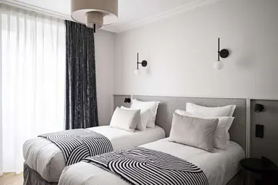 Un ou plusieurs lits dans un hébergement de l'établissement Best Western Premier The Blake Paris Gare Saint Lazare