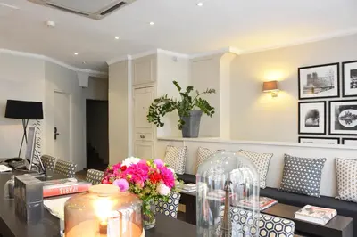 Coin salon dans l'établissement Villa Des Princes