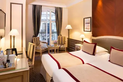 Un ou plusieurs lits dans un hébergement de l'établissement Best Western Premier Trocadero La Tour