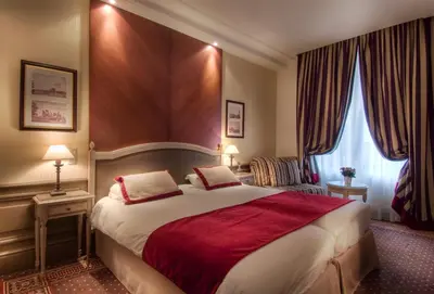 Un ou plusieurs lits dans un hébergement de l'établissement Best Western Premier Trocadero La Tour