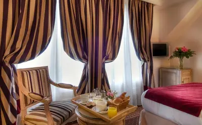 Un ou plusieurs lits dans un hébergement de l'établissement Best Western Premier Trocadero La Tour