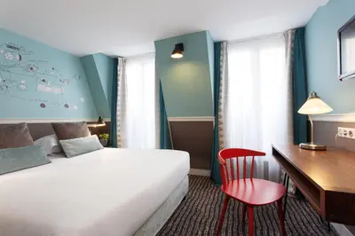 Un ou plusieurs lits dans un hébergement de l'établissement Hôtel des 3 Poussins