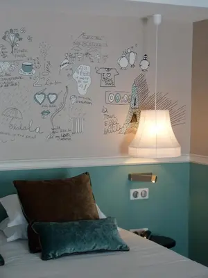 Un ou plusieurs lits dans un hébergement de l'établissement Hôtel des 3 Poussins