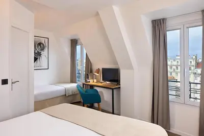 Un ou plusieurs lits dans un hébergement de l'établissement Hotel OHM by Happyculture