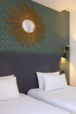 Un ou plusieurs lits dans un hébergement de l'établissement Hotel OHM by Happyculture