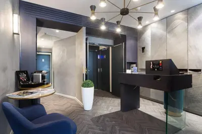 Télévision ou salle de divertissement dans l'établissement Hotel OHM by Happyculture