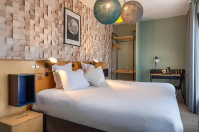Un ou plusieurs lits dans un hébergement de l'établissement Hotel Bootcamp